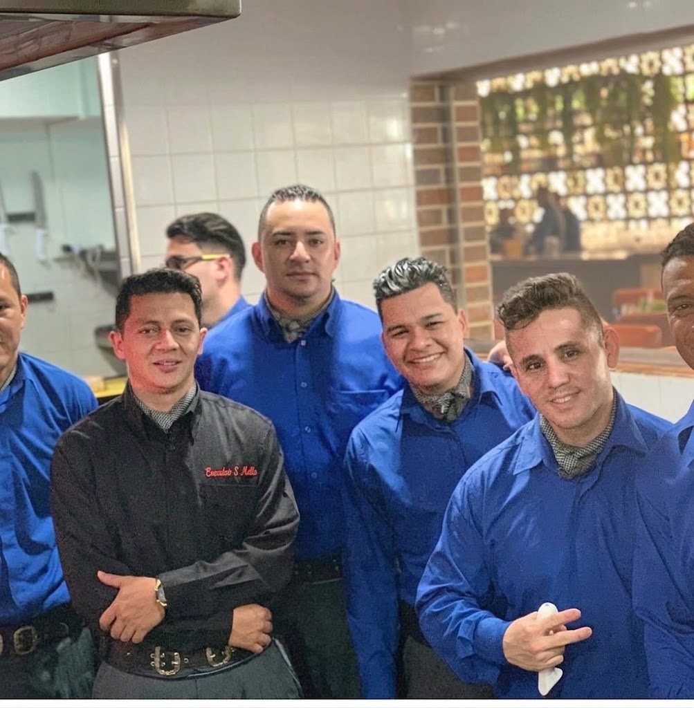 Evandoir S Mello com equipe treinada